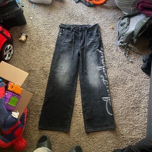 Men's Black Relaxed Jeans with White Graphic